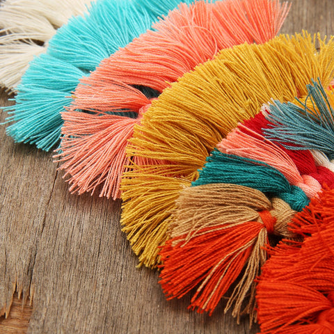 Boucle d’oreille macramé plume